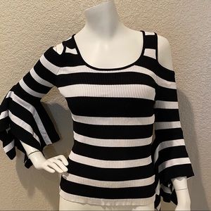 Scripted knit top flare bell sleeves and  cut out shoulders